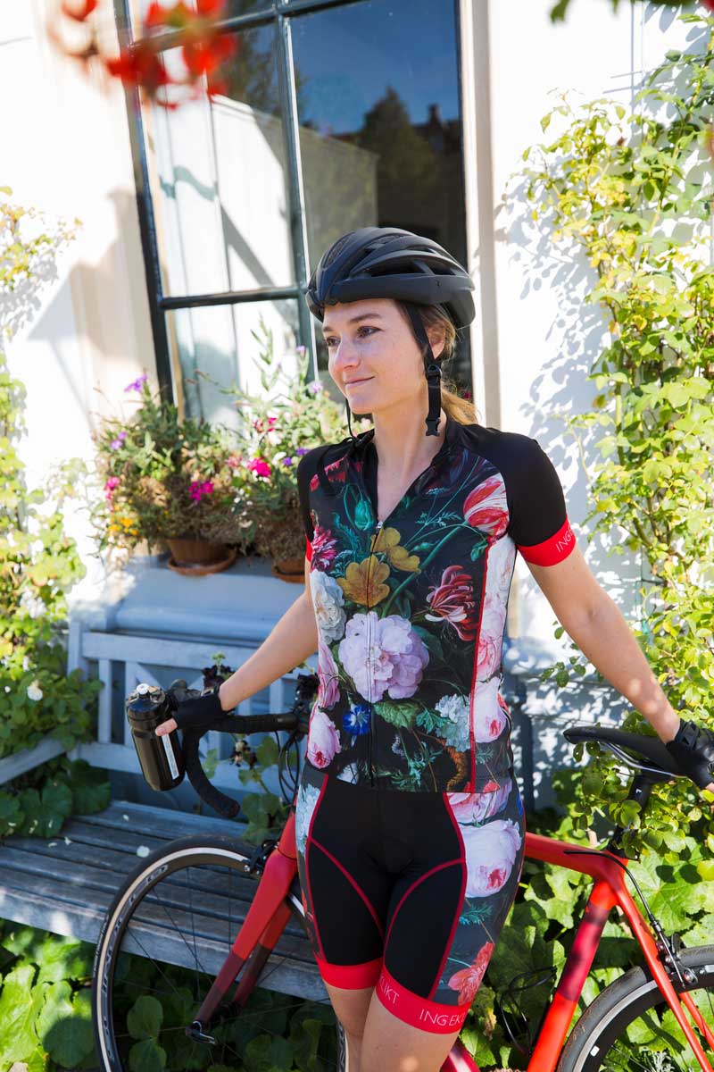 gereedschap lila seks Flower Bomb dames fietsshirt | zwart-rood met bloemenprint