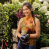 goud-okergeel fietsshirt voor dames met bloemen en zonder mouwen