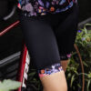 zwarte dames bibshorts met blauw-paarse vlinderprint